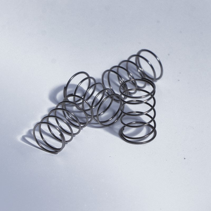 Springs — Spring Steel · Stainless — custom CNC machined parts